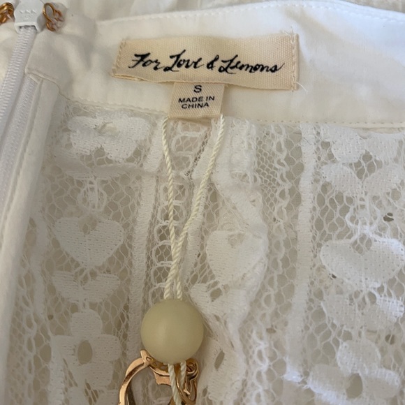 FOR LOVE & LEMONS
Charlotte Eyelet Mini Skirt - Picture 6 of 12